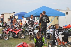 A group of ATV racers wait for the race to start