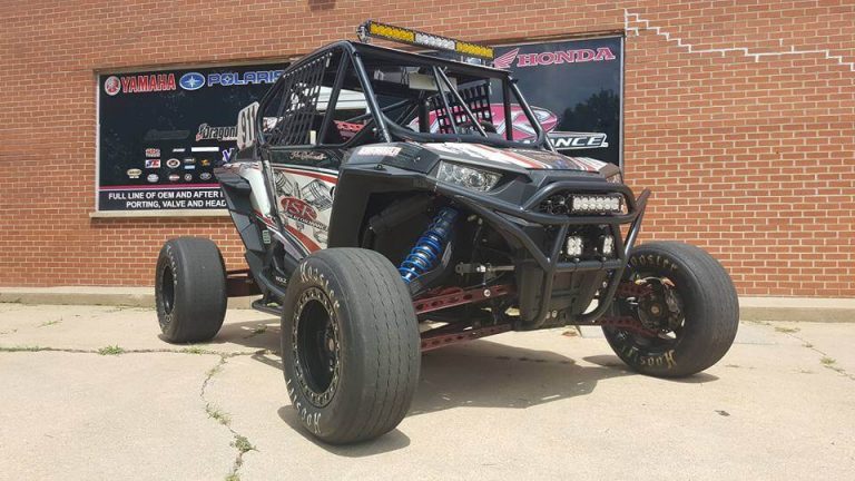 The JSR Performance UTV sits in front of the shop