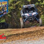 The JSR Performance UTV, lands front tires first during a race